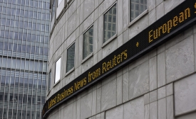 Photo reprinted courtesy Senseiich via Wikimedia Commons Canary Wharf news ticker
