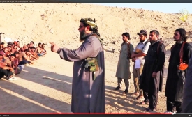 Photo reprinted courtesy Karl-Ludwig Poggemann, via Flickr https://flic.kr/p/pDFUKB Video still from an Islamic State training video