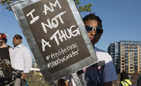 Photo reprinted courtesy Fibonacci Blue, via Flickr https://flic.kr/p/s6Kskm Minneapolis rally to support the people of Baltimore