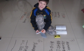 Photo reprinted courtesy IvanWalsh.com via Flickr A young student learns Chinese.