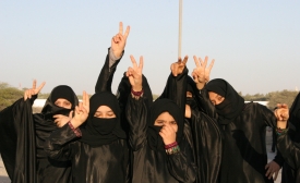 Photo reprinted courtesy Al Jazeera English, via Flickr https://flic.kr/p/9ieCZd Shia women protest the Sunni dictatorship in Bahrain