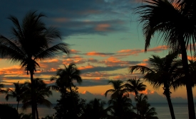 Photo reprinted courtesy Trish Hartmann, via Flickr https://flic.kr/p/dJBYrM Sunset over Puerto Rico