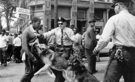 Photo reprinted courtesy Nasa-verve via Wikimedia Commons The iconic 1963 photo "Birmingham campaign dogs" by Bill Hudson, of the Associated Press