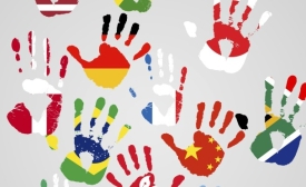 Photo Source: iStock/Yuri_Arcurs http://www.istockphoto.com/photo/lending-a-hand-to-global-change-46145520?st=07f0857