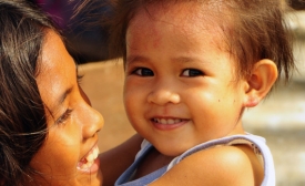 Photo reprinted courtesy the International Organization for Migration A migrant family