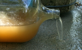 Copyright Ildar Sagdejev CC Wikimedia Commons Dirty water spilling from a bottle, by Ildar Sagdejev
