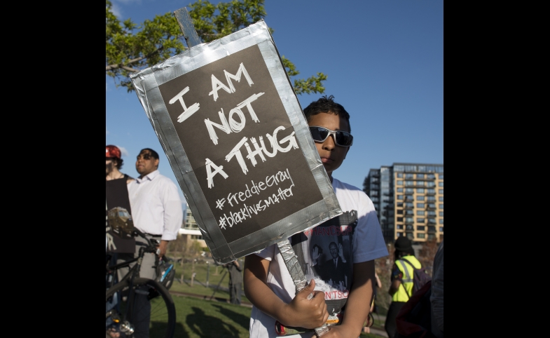Photo reprinted courtesy Fibonacci Blue, via Flickr https://flic.kr/p/s6Kskm Minneapolis rally to support the people of Baltimore