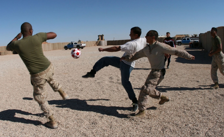 Photo reprinted courtesy of DVIDSHUB via Flickr Marines Share American Tradition With Iraqi Highway Patrol, by DVIDSHUB