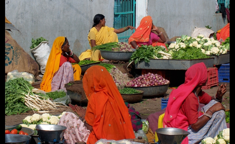 Photo reprinted courtesy John Haslam, via Flickr https://flic.kr/p/673g2Q Vegetable market; Kuchaman, Rajasthan, India