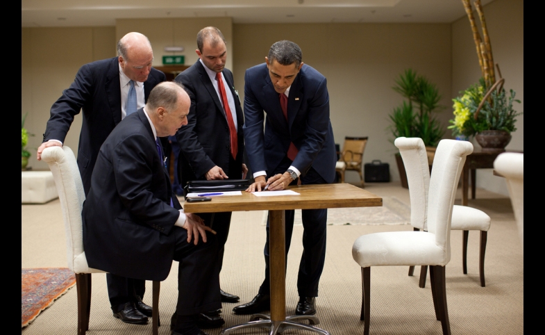 Photo courtesy USAFRICOM via Flickr Ben Rhodes stands next to President Barack Obama
