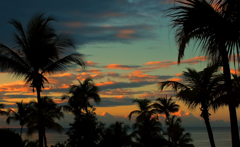 Photo reprinted courtesy Trish Hartmann, via Flickr https://flic.kr/p/dJBYrM Sunset over Puerto Rico