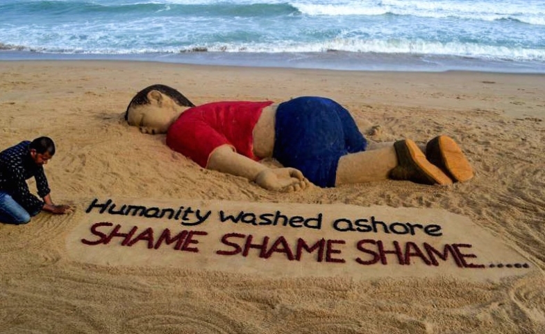 Photo by Freedom House/ CC by-SA 2.0 Aylan Sand Sculpture