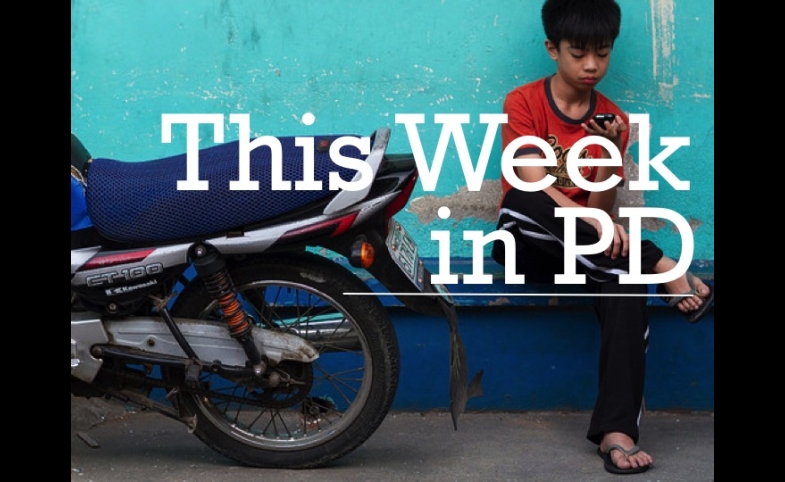 Motorcycle & Mobile Phone by Adam Cohen via Flickr Creative Commons