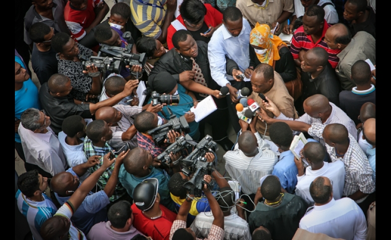 Photo courtesy of Muhammad Mahdi Karim/www.micro2macro.net through a GNU Free Documentation License 1.2 via Wikimedia Commons Police Commissioner Suleiman Kova answers and addresses the media at ground zero near the 2013 Dar es Salaam building collapse