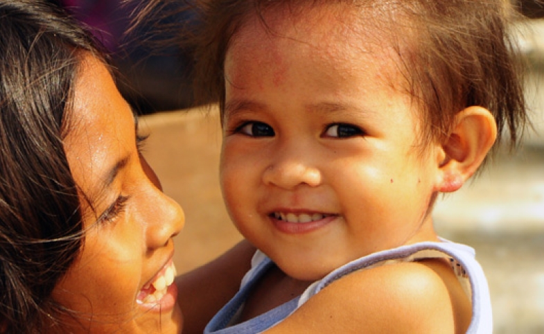 Photo reprinted courtesy the International Organization for Migration A migrant family