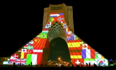 Photo: Screenshot of video taken near Azadi Tower in Tehran, Iran displaying messages of global solidarity in response to the COVID-19 pandemic.